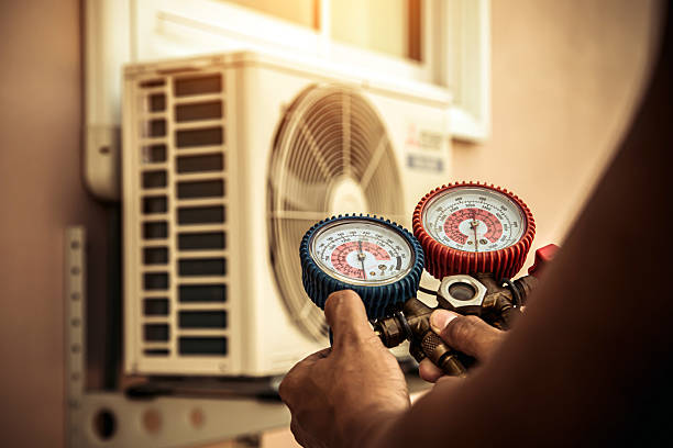 Professional Ductwork Repair technician working in Woodstock, AL